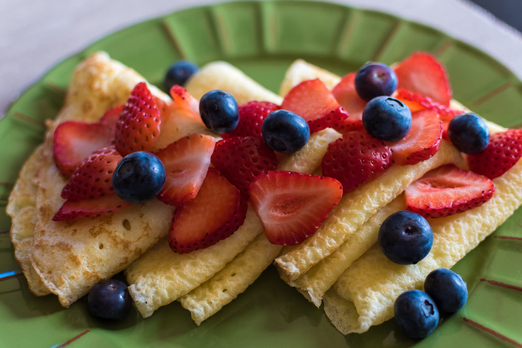 Crepes with strawberries and blueberries